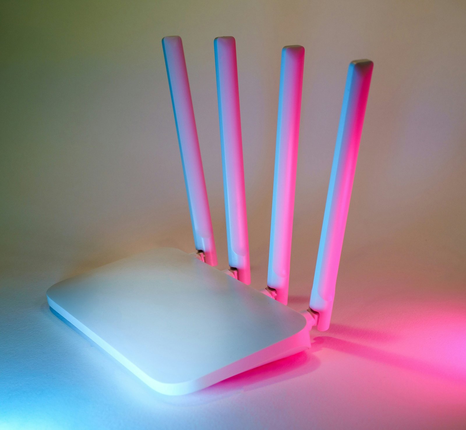 A white laptop computer sitting on top of a table